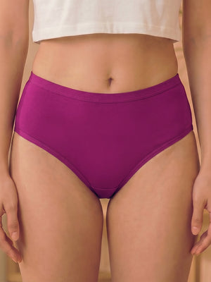 Purple high-waisted underwear worn by a person on a beige background