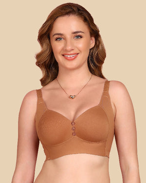 Woman wearing a brown bra against a beige background