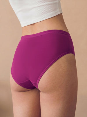 Purple underwear worn by a person on a beige background