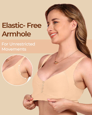 Woman wearing a beige bra with an elastic-free armhole feature, on a beige background.