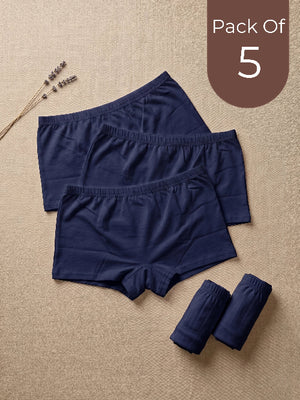 Pack of 5 navy blue boxer briefs on a beige background with lavender flowers.