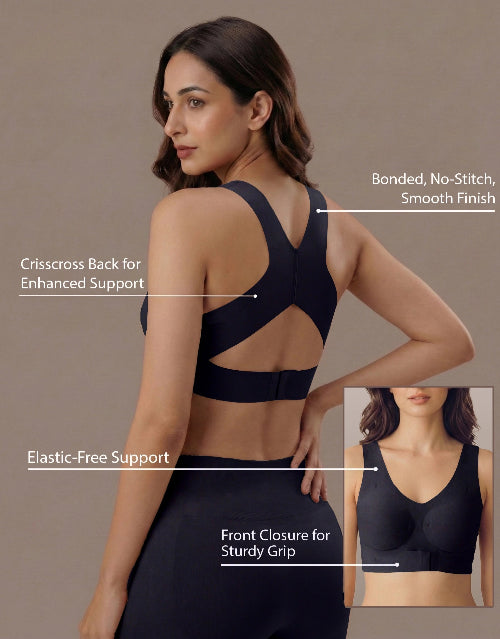 Woman wearing a black sports bra with text highlighting features on a beige background