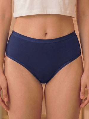 Navy blue high-waisted bikini bottom worn by a person on a beige background