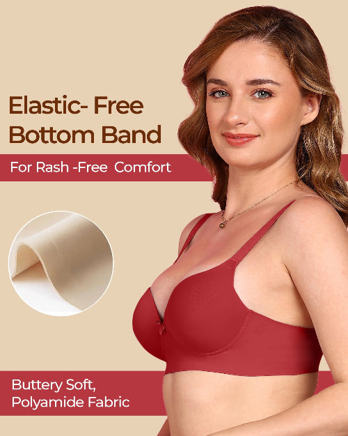 Woman wearing a red bra with text about elastic-free bottom band and buttery soft polyamide fabric on a beige background.