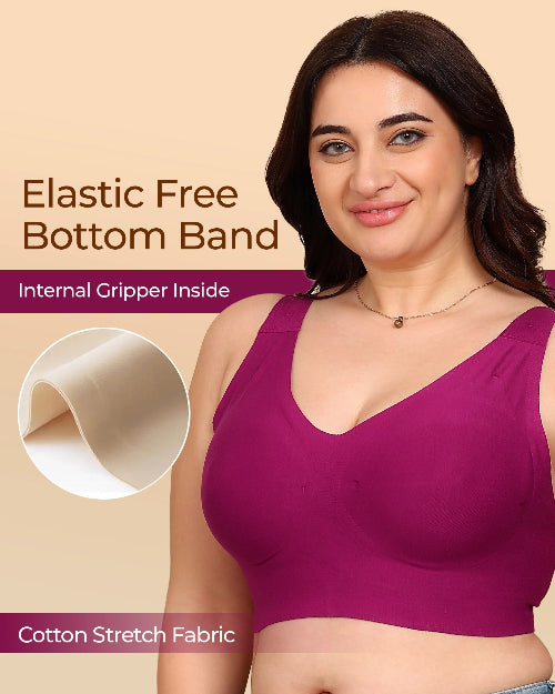 Woman wearing a purple bra with text about an elastic free bottom band and cotton stretch fabric.