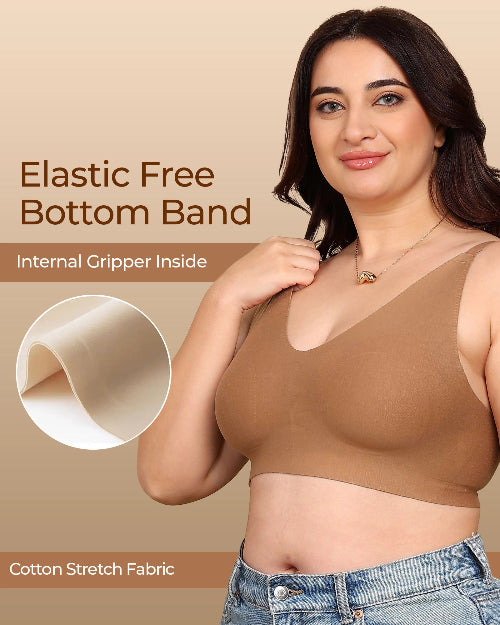 Woman wearing a brown bra with text about an elastic free bottom band on a beige background