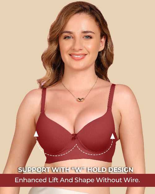 Woman wearing a maroon bra with text highlighting support features on a beige background