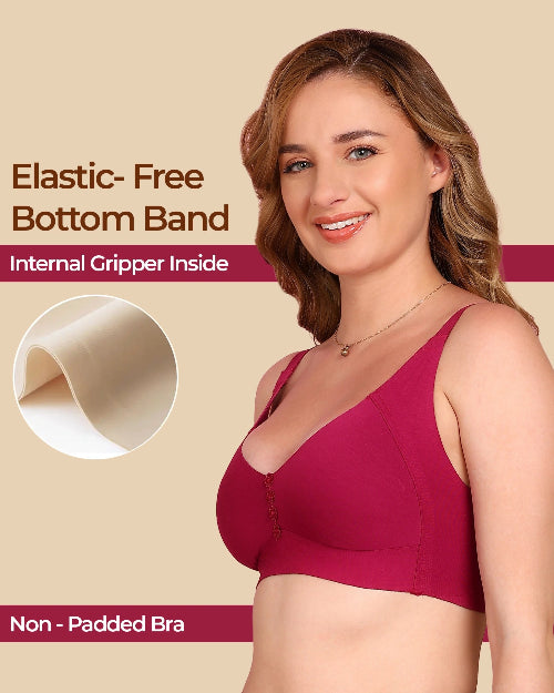 Woman wearing a red bra with text about an elastic-free bottom band on a beige background