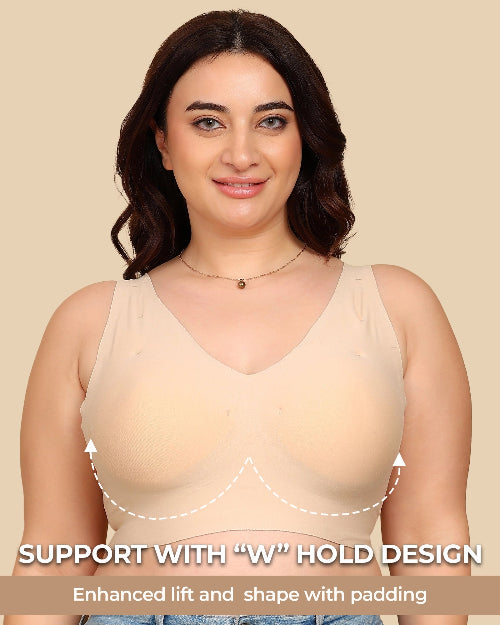 Woman wearing a beige tank top with text highlighting support design on a beige background