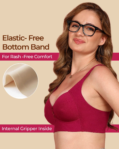 Woman wearing a red bra with text about elastic-free bottom band on a beige background