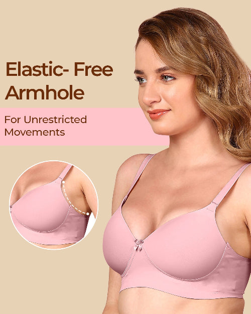 Woman wearing a pink bra with text highlighting 'Elastic-Free Armhole' on a beige background