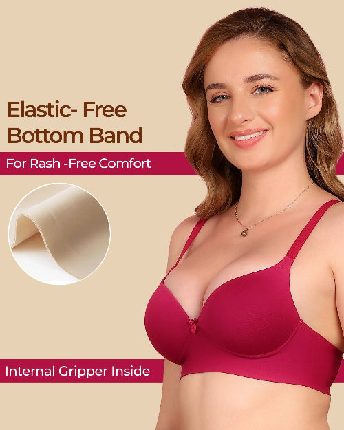 Woman wearing a red bra with text about elastic-free bottom band and internal gripper on a beige background