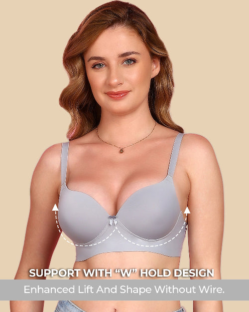 Woman wearing a gray bra with text highlighting support features on a beige background