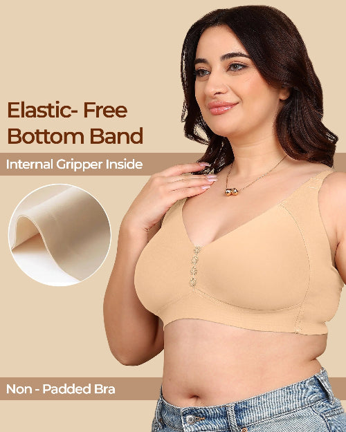 Woman wearing a beige non-padded bra with text about elastic-free bottom band and internal gripper.