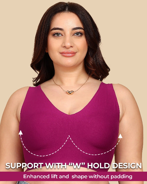 Woman wearing a purple tank top with text about 'W' hold design on a beige background