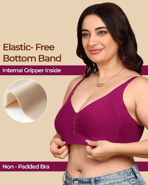 Woman wearing a purple non-padded bra with text about elastic-free bottom band and internal gripper.