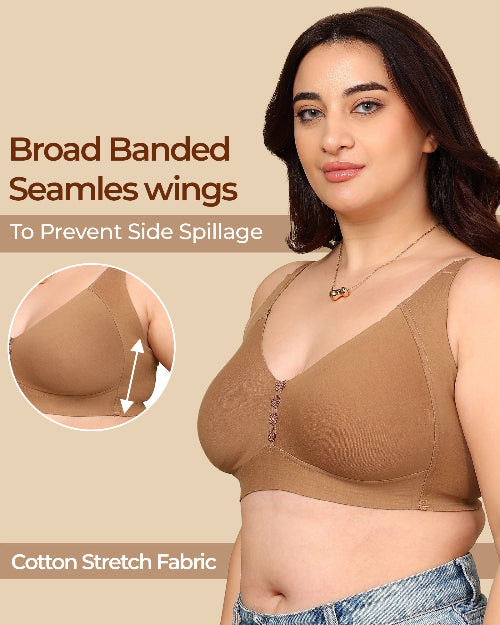 Woman wearing a brown bra with text about seamles wings and cotton stretch fabric on a beige background