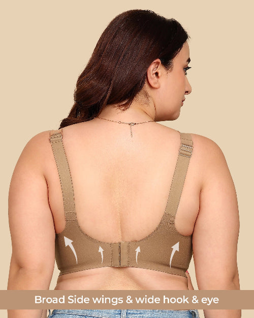 Woman wearing a beige sports bra with text highlighting features on a beige background