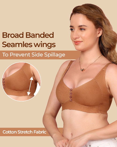 Woman wearing a brown bra with text about seamles wings and cotton stretch fabric on a beige background.