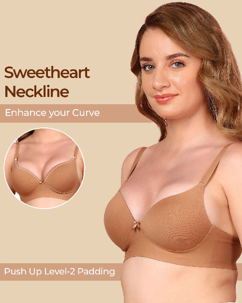 Woman wearing a brown bra with 'Sweetheart Neckline' and 'Push Up Level-2 Padding' text on a beige background.