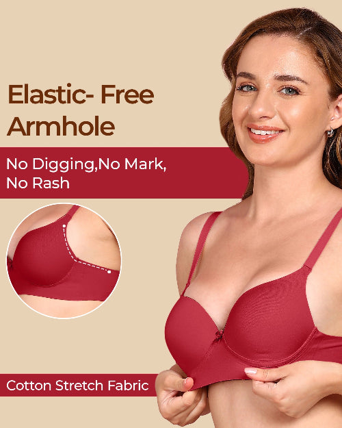 Woman wearing a red bra with text highlighting elastic-free armhole design on a beige background