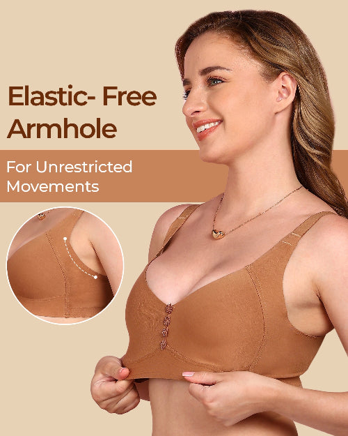 Woman wearing a brown bra with an elastic-free armhole feature, on a beige background.