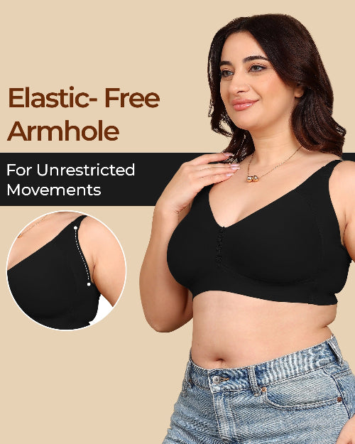 Woman wearing a black bra with text about elastic-free armholes on a beige background