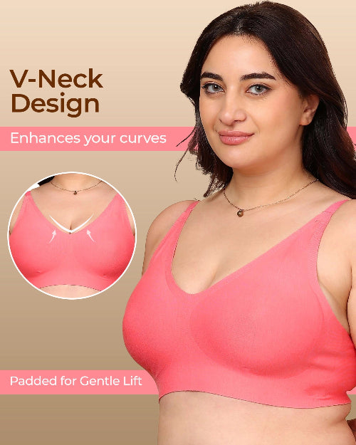 Woman wearing a pink V-neck bra with text highlighting design features on a beige background