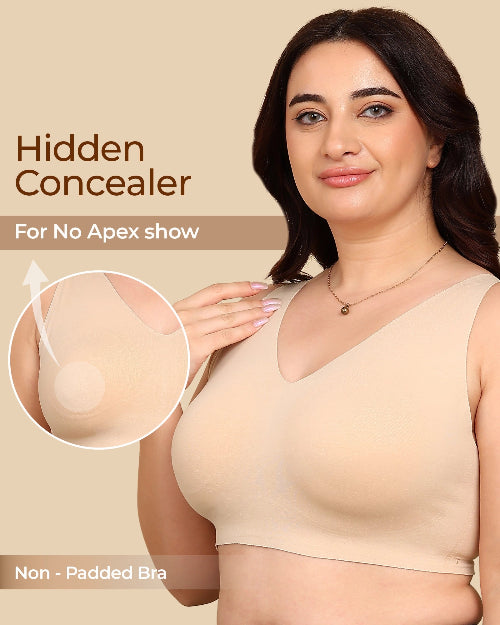 Woman wearing a beige non-padded bra with 'Hidden Concealer' text and inset showing no apex show feature.