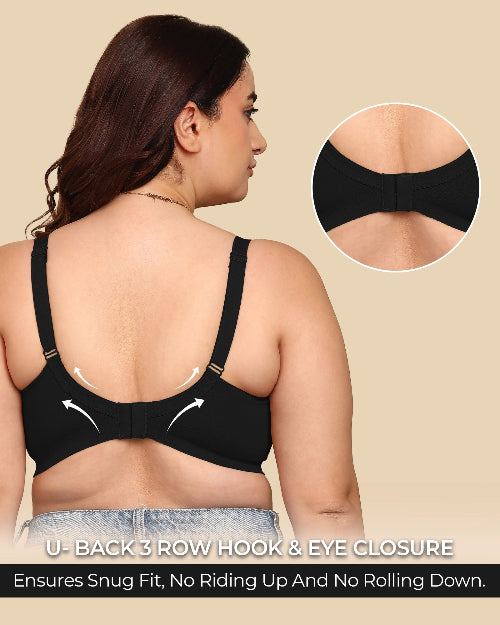Woman wearing a black bra with close-up details on a beige background