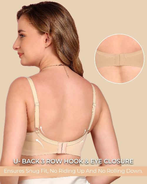 Woman wearing a beige backless top with close-up details on a beige background