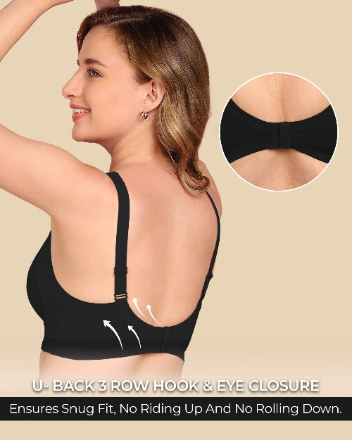 Woman wearing a black bra with close-up details on a beige background