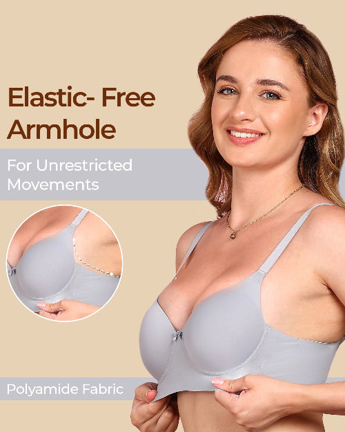 Woman wearing a gray bra with text highlighting elastic-free armhole design on a beige background