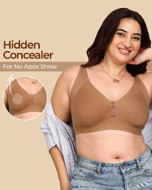 Woman wearing a brown bra with 'Hidden Concealer' feature on a beige background