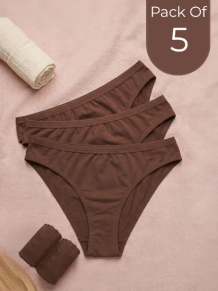 Pack of 5 brown underwear on a pink background with rolled-up towels.