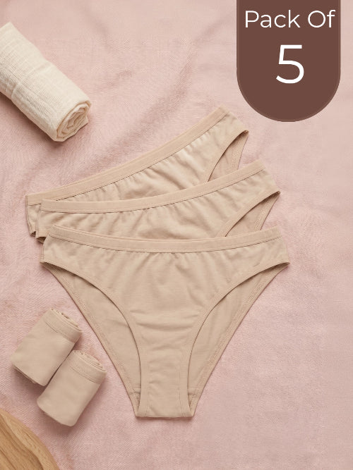 Pack of 5 beige women's underwear on a pink background