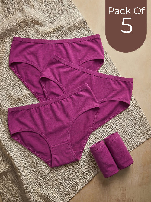 Pack of 5 purple women's underwear on a textured surface